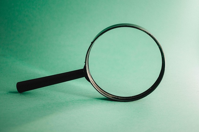 magnifying glass on green background